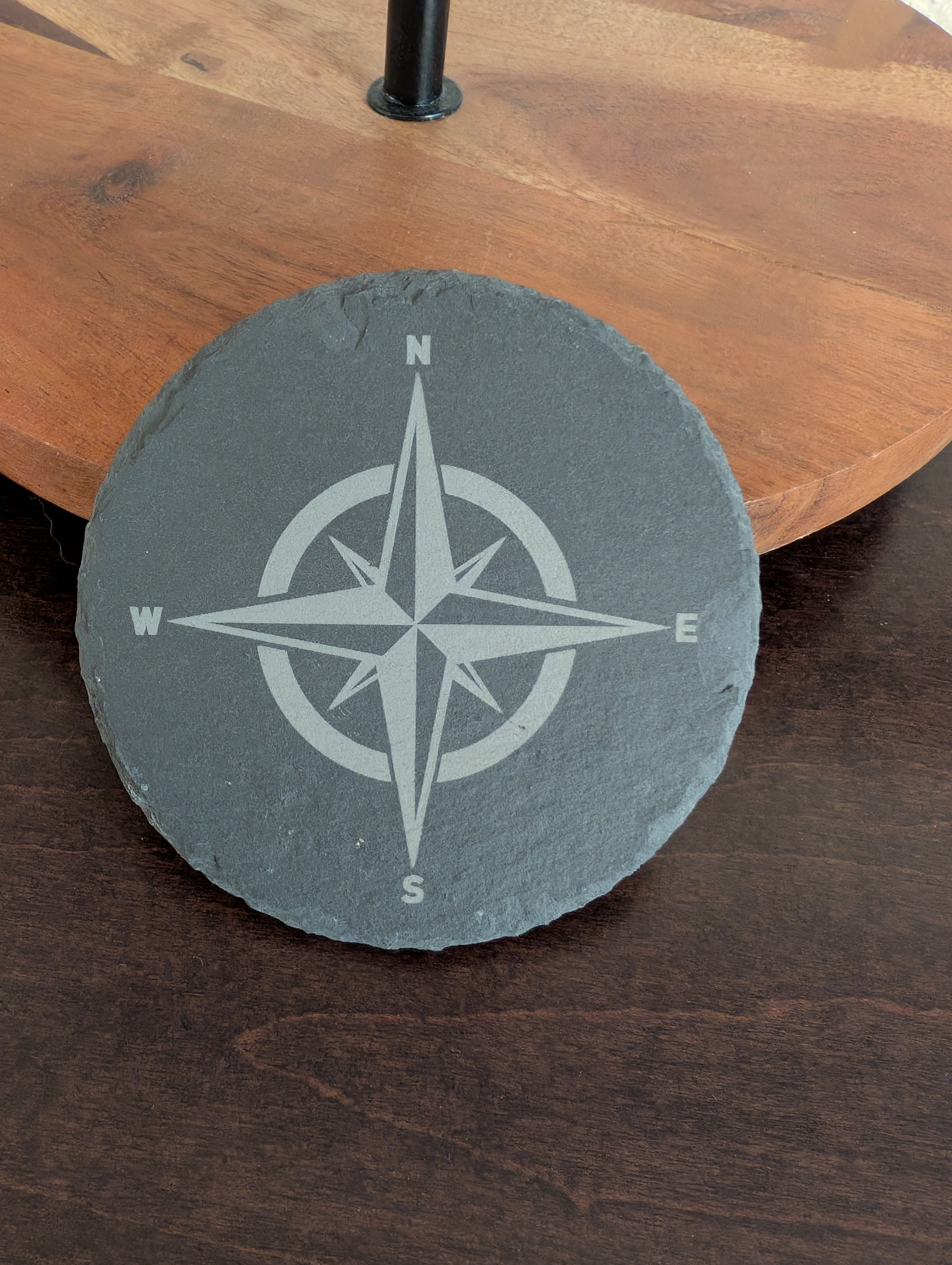 Laser engraved coaster set with compass design